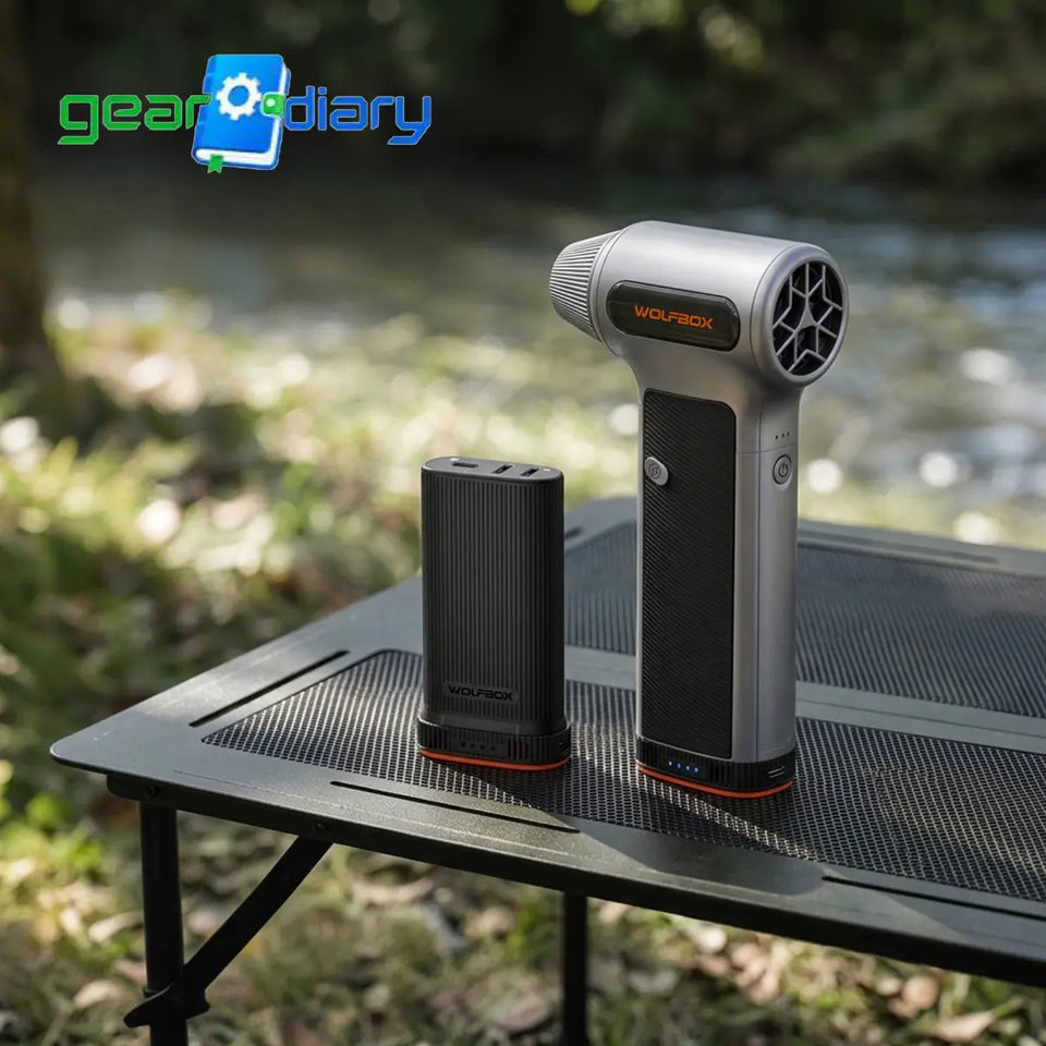 WOLFBOX camping gear beside an outdoor table